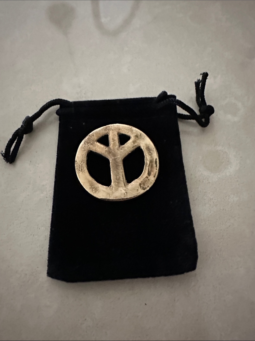 Hand casted ,Brass polished Peace golf ball marker,  weighs 12 grams